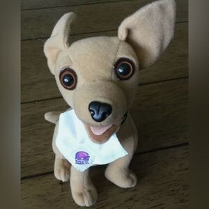 Taco Bell chihuahua vintage plush, a lot of 8, each new with a different theme.